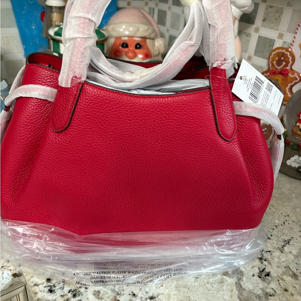 !NEW!  

Beautiful! Kate spade!

CHERRY RED! 

LARGE! 
dumpling satchel.